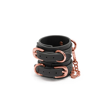 Bondage Couture Wrist Cuffs Black with Rose Gold NS Novelties