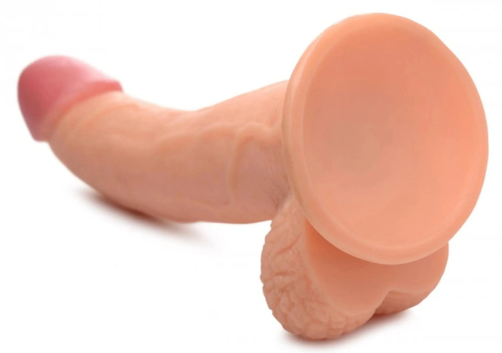 POP 7.5IN DILDO W/ BALLS LIGHT XR Brands